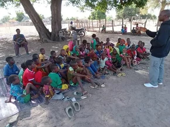 Picture of children sitting together in a group